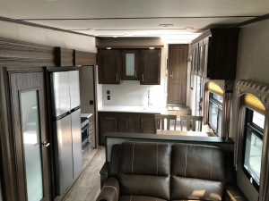 Spacious headroom, full sized appliances and more in the Laredo 342RD at Byerly RV